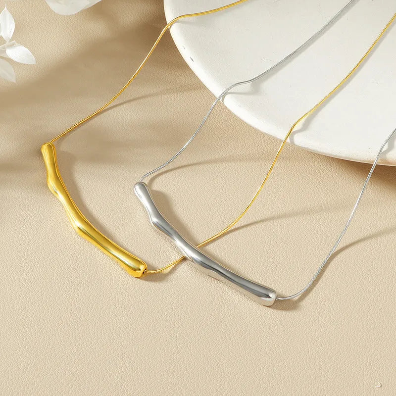 Women's titanium steel necklace with irregular pleated design in gold electroplated finish