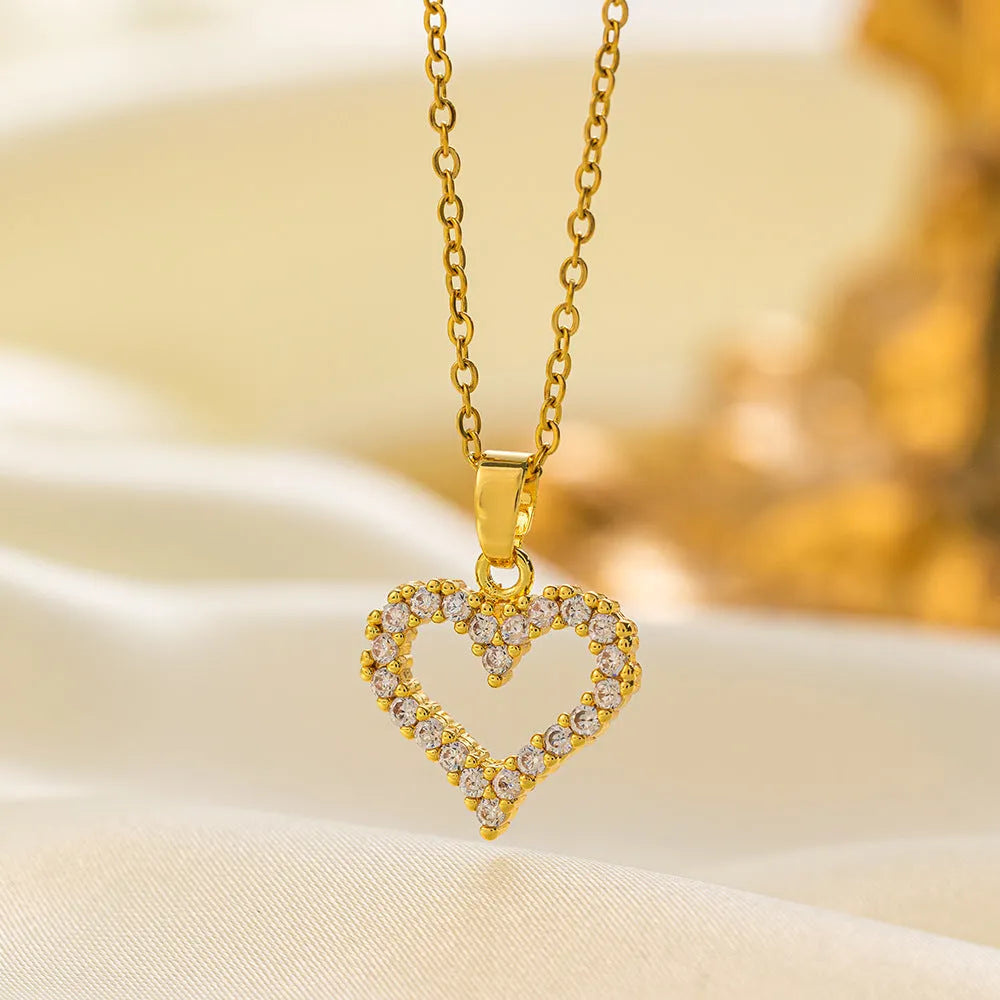 Women's titanium steel and copper-plated pendant necklace set crescent heart shapes gold and steel finish