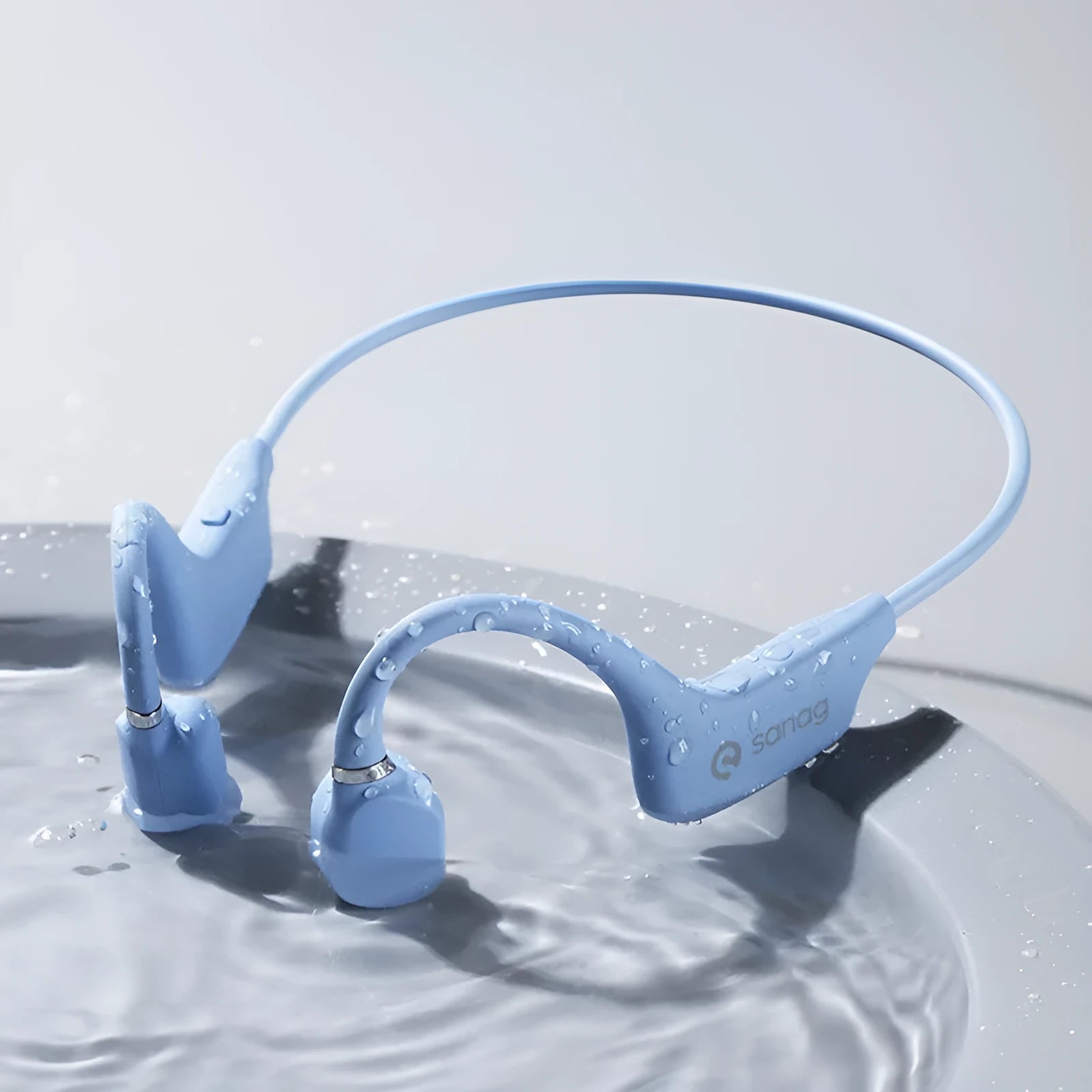 Bone conduction Bluetooth headset with a hanging neckband, shown in one of six colour options.