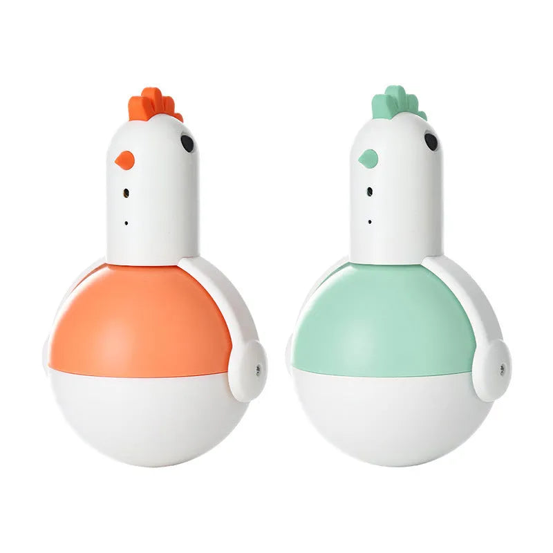Green electric cat toy chicken with laser light and sound functions on flat surface