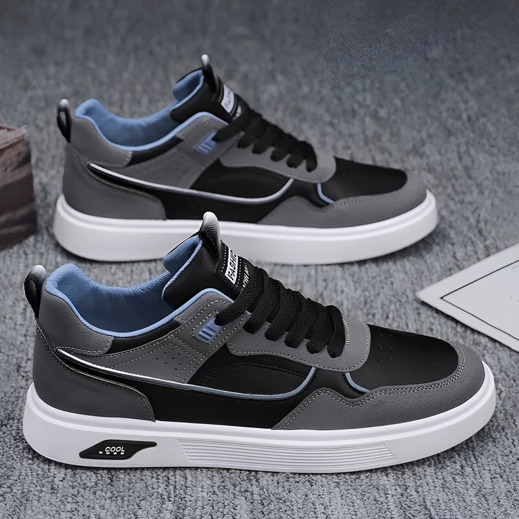 Men's low-top canvas board shoes in solid colours with leather stitching and mesh lining.