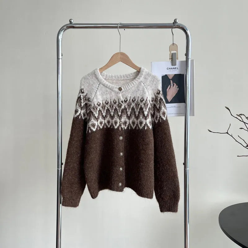 Women's loose-fit jacquard sweater coat in milky white, shown with long sleeves and a textured pattern.