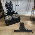 Custom dog name food bowl holder with stainless steel bowl and iron decoration on a metal stand.