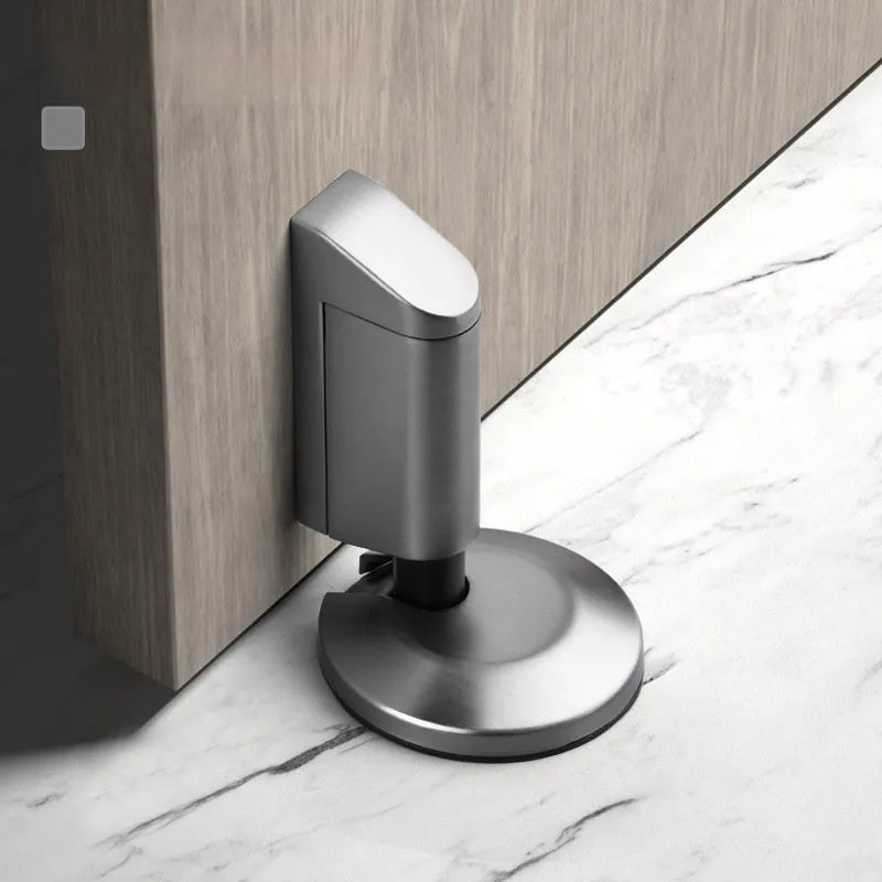 Modern invisible door stopper made of zinc alloy shown in brushed nickel finish
