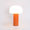 USB-powered plastic table lamp in a choice of white, black, orange, or green colours.