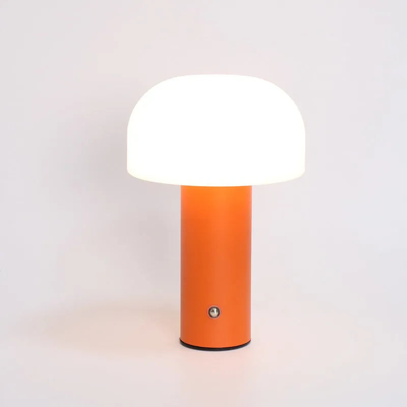 USB-powered plastic table lamp in a choice of white, black, orange, or green colours.