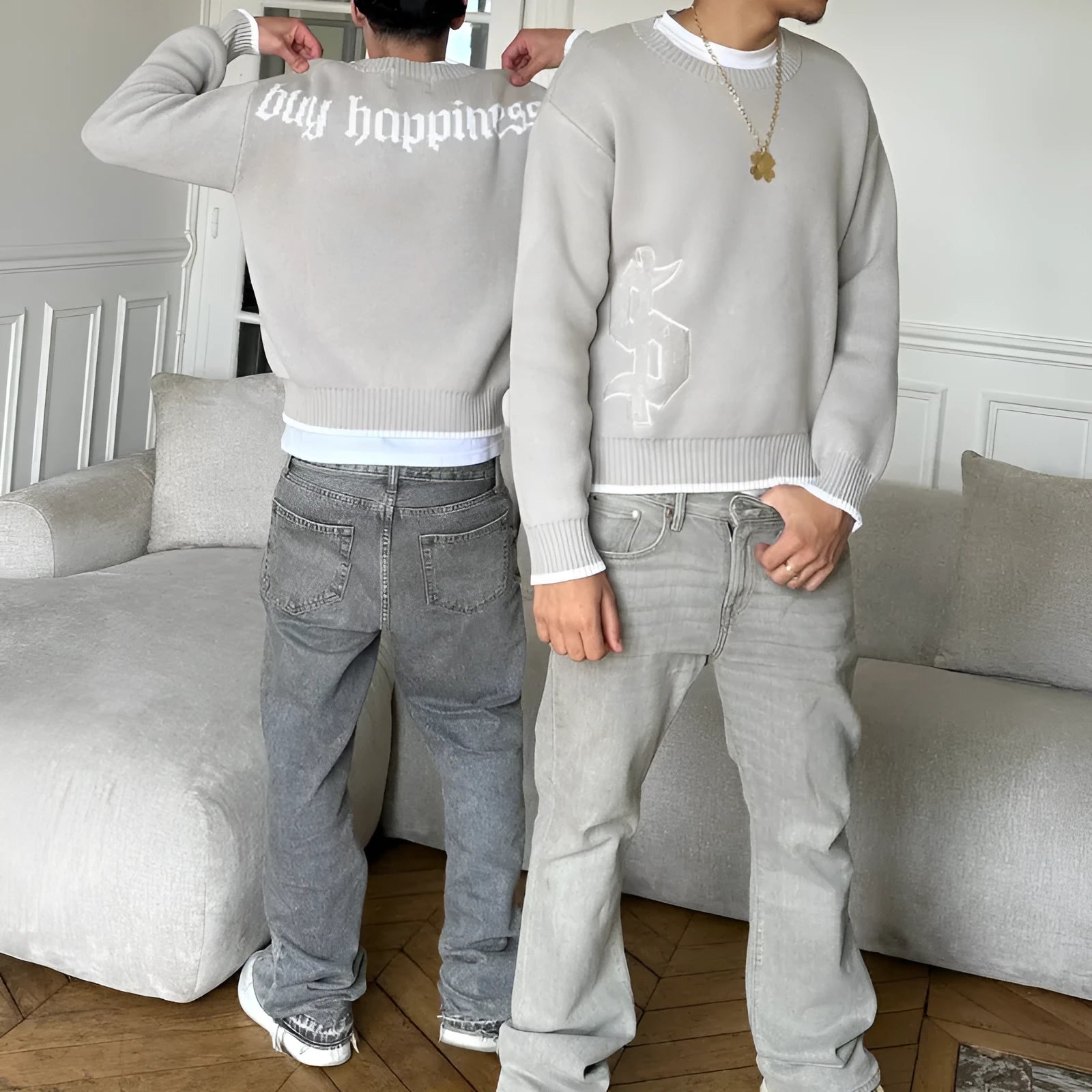 Grey jacquard loose-fitting knitwear coat with long sleeves on hanger