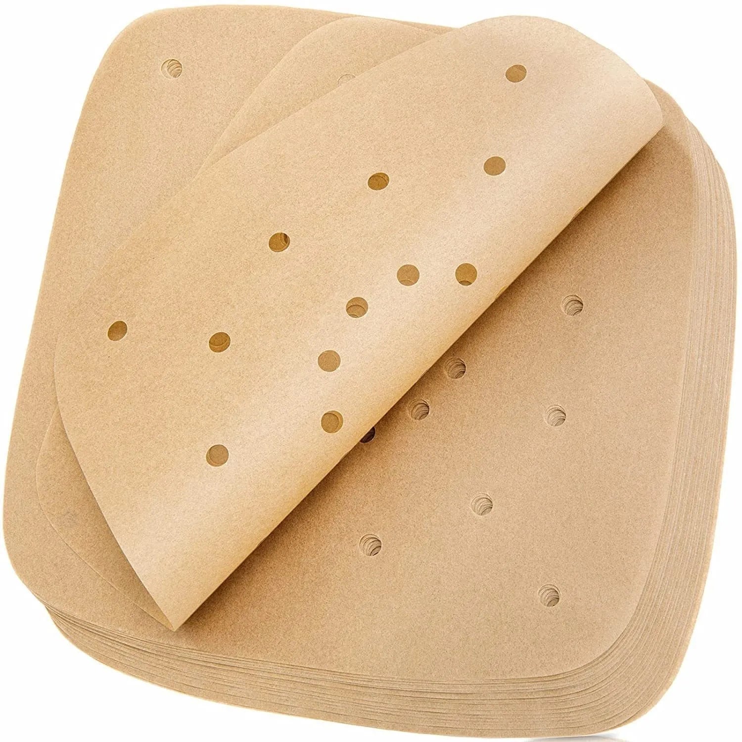 Stack of oiled paper square baking sheets with holes for air fryer use natural colour 20cm