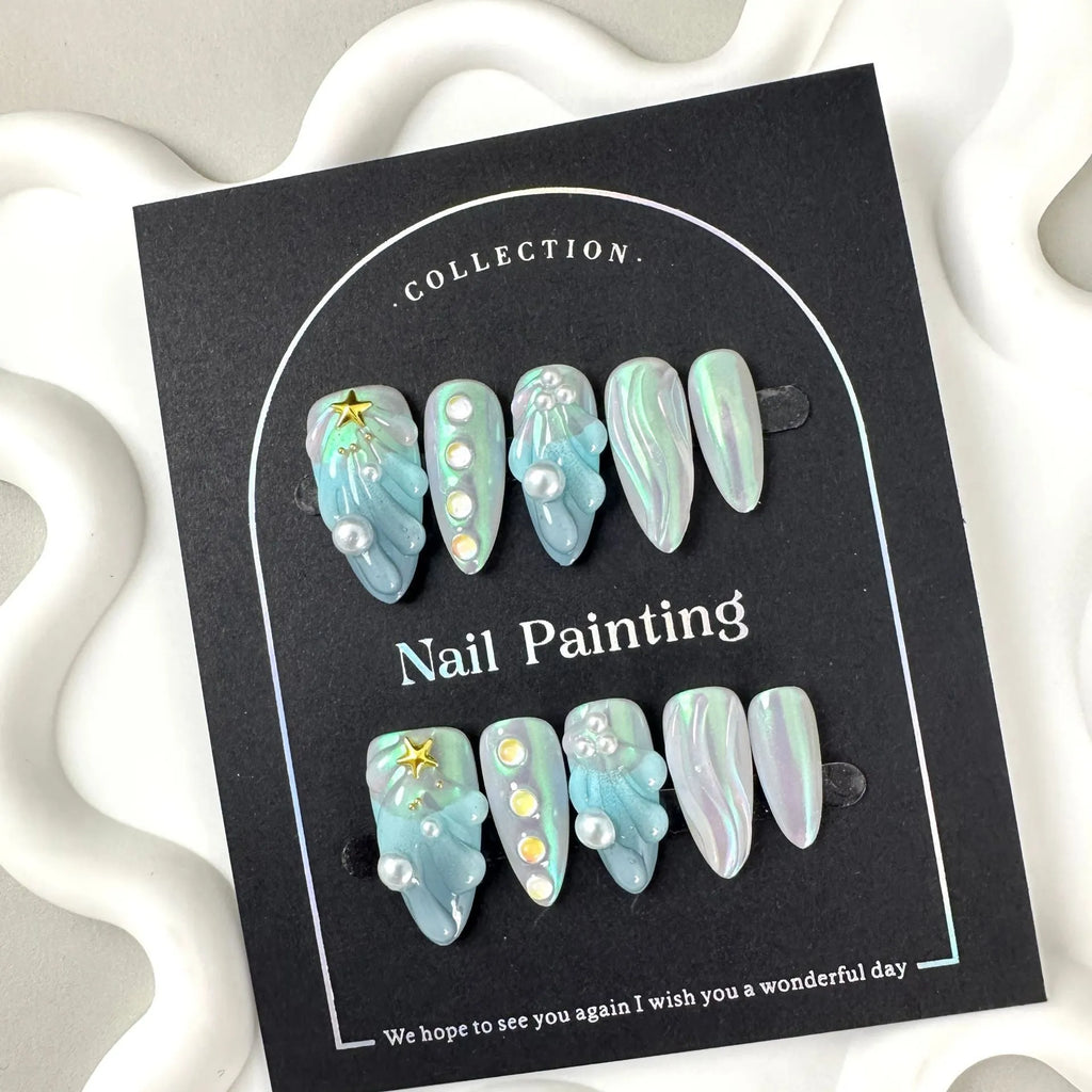 Blue plastic HAILANG false nail tips set showing sizes XS, S, M, L on a card.