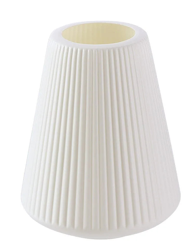 Melamine plastic decorative vase in blue colour on desktop with floral arrangement