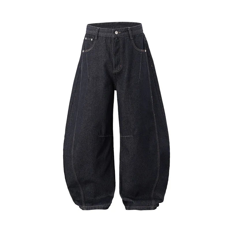 Men's wide leg cotton denim trousers in original cow colour, shown laid flat.