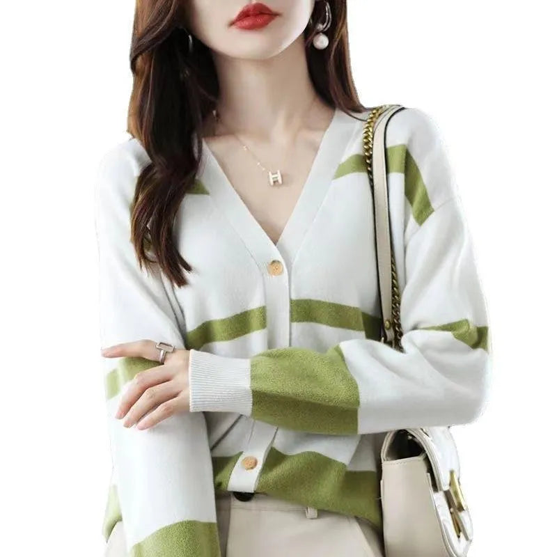 Women's striped V-neck knitted cardigan in a slim fit, showing 3D pattern detail.