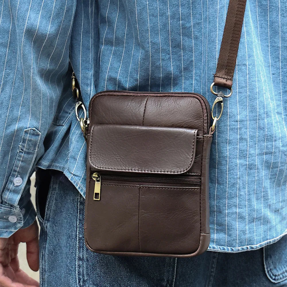 Men's brown genuine leather crossbody shoulder bag with sewing line detailing.