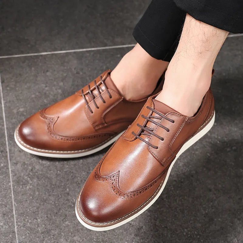 Men's black slip-on business casual shoes with round toe and low-cut PU upper on a TPR sole.