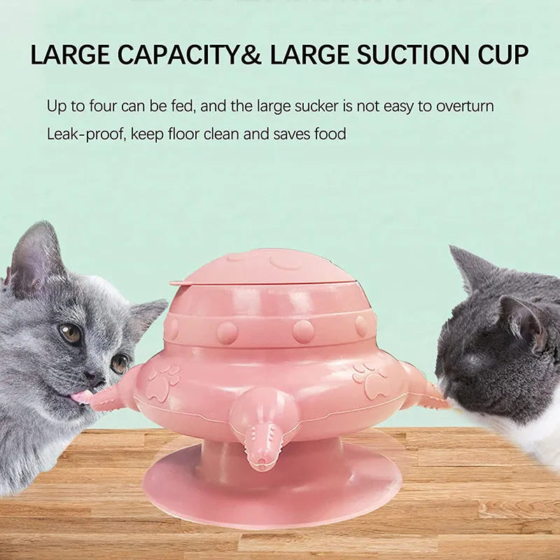 Pink silicone pet nursing bottle with bionic breast-shaped pacifier on a flat base, with three additional pacifiers.