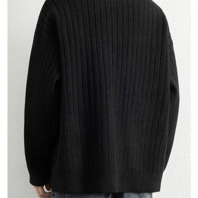 Men's grey textured knit half-zip pullover sweater with loose fit and long sleeves