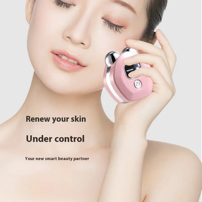 Portable micro current facial massage instrument with dual rollers in light blue colour