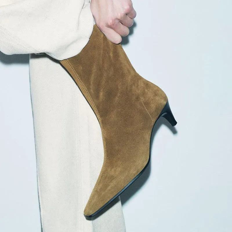 Brown square toe high heel boots with side zipper and a kitten heel on a waterproof platform sole.