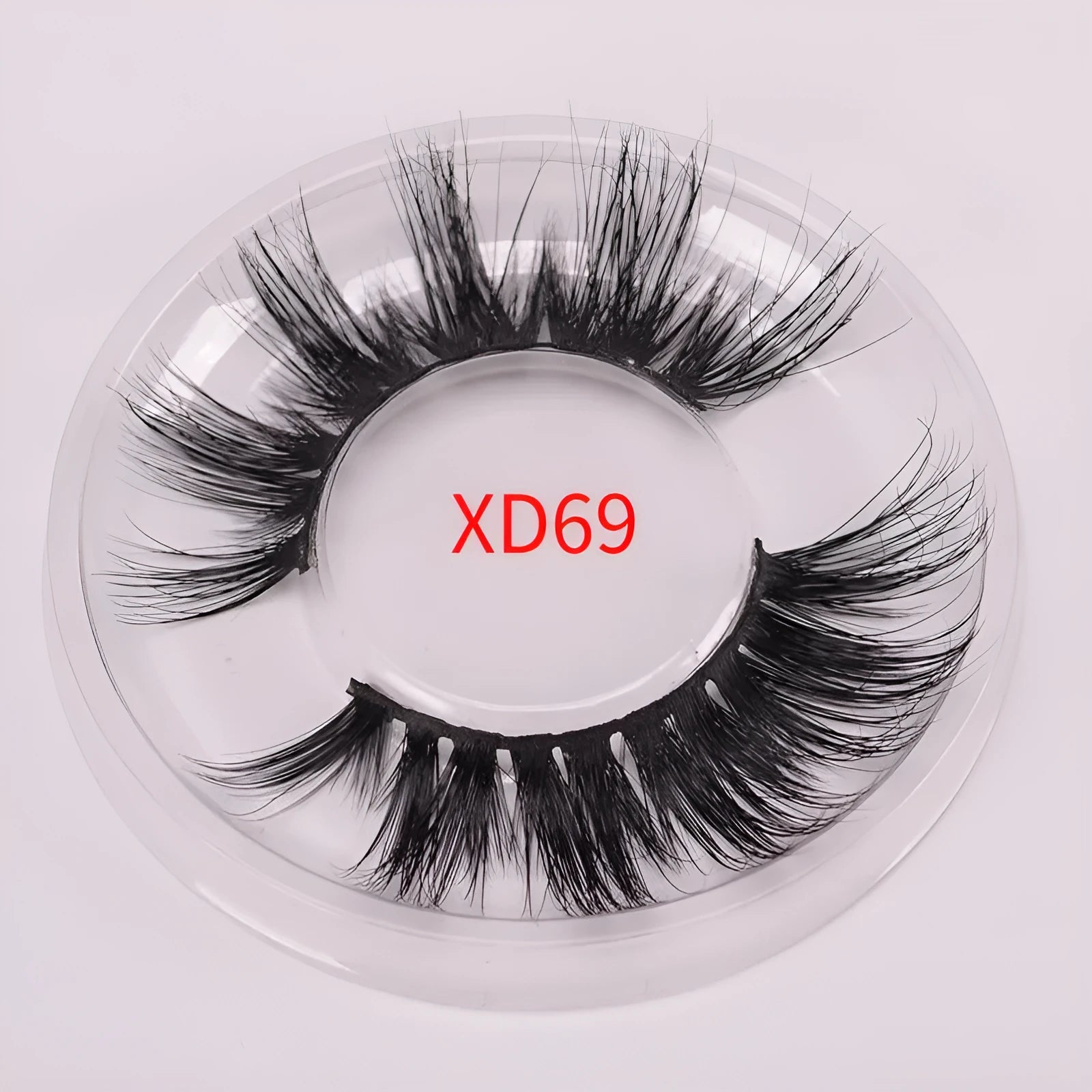 5D mink hair false eyelashes set with applicator brush and storage cap on white background