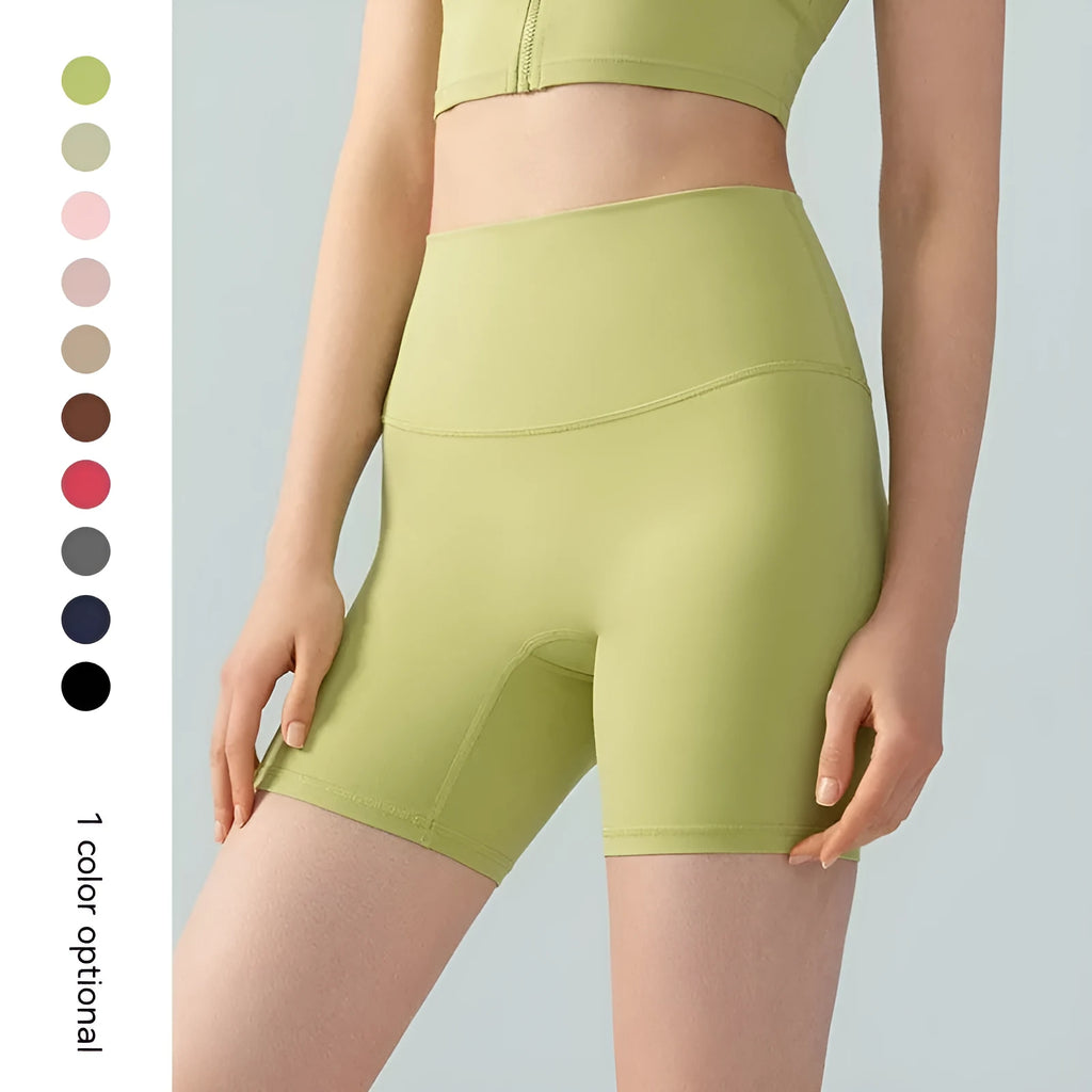 Women's high-waist Lycra yoga shorts in leaf green, short length for cycling and exercise.