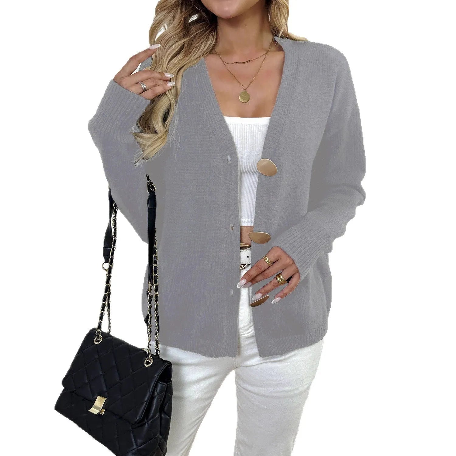 A grey women's deer plush long sleeve sweater coat with Princess sleeves on a hanger.