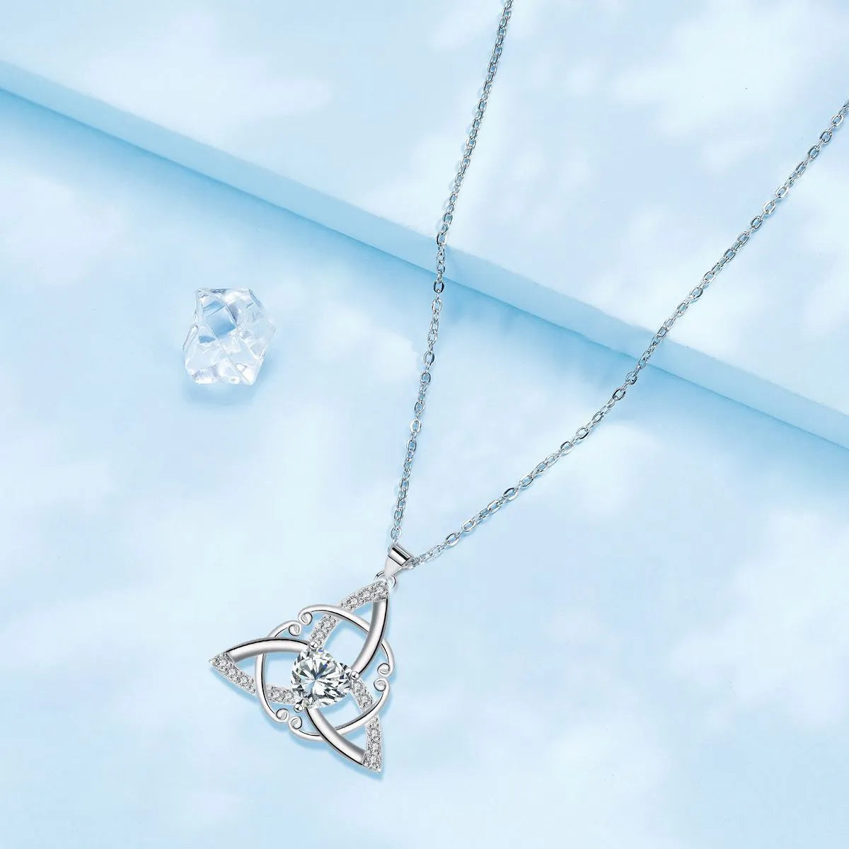 Women's Celtic knot necklace with geometric pendant in electroplated finish on copper chain