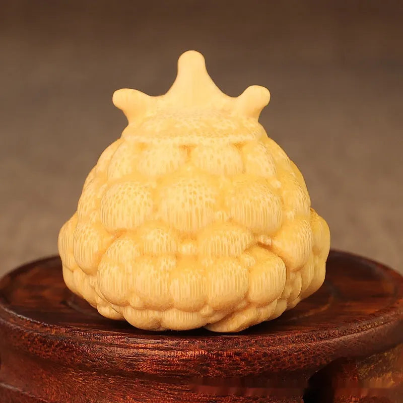 Solid bamboo carving of a Crown Princess Toad hand ornament in cute style.