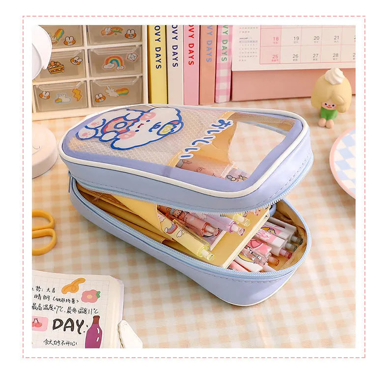 Transparent PVC pencil case with cartoon bear design showing pens inside