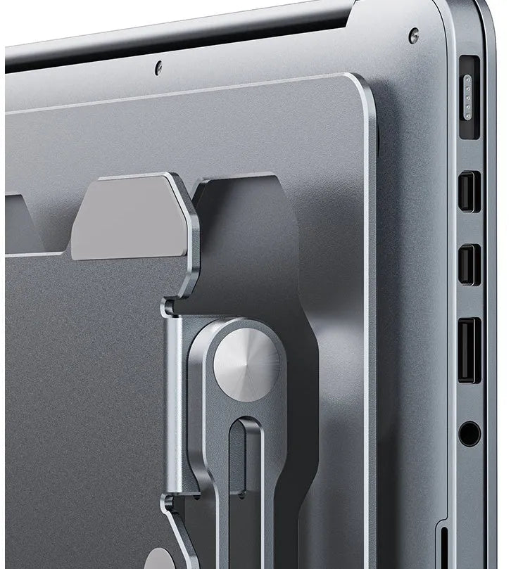 Grey aluminum laptop stand showing adjustable angle mechanism and folding design