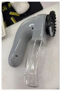 Grey portable pet hair removal vacuum brush with soft rubber head for grooming dogs and cats