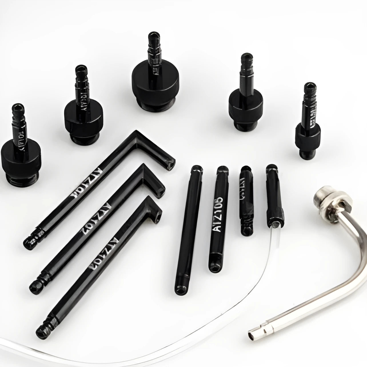 Thirteen-piece transmission oil refuelling kit with pumping mechanism and multiple vehicle connectors