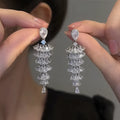 Copper Christmas tree drop earrings with sparkling zircon in silver pagoda colour