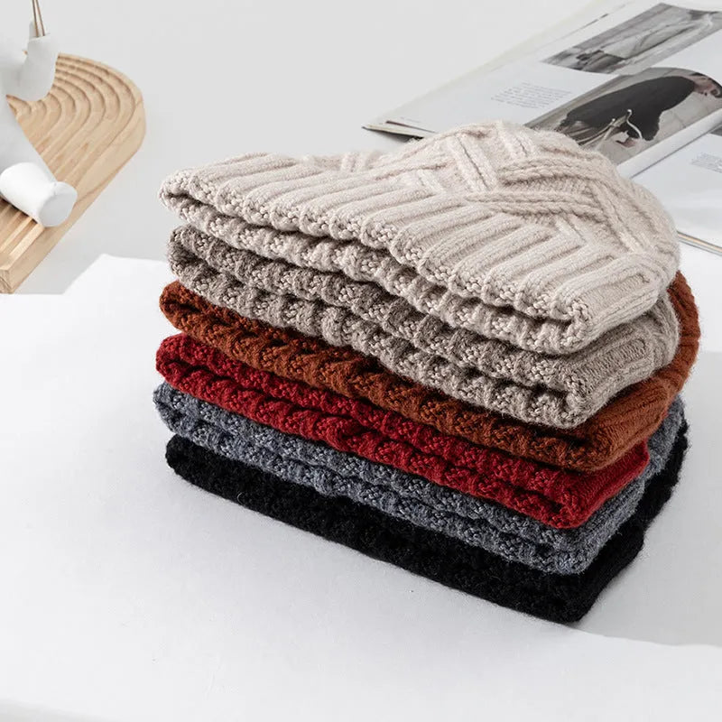 Women's knitted wool dome hat in one of six colours: ivory white, khaki, red, brown, gray, or black.