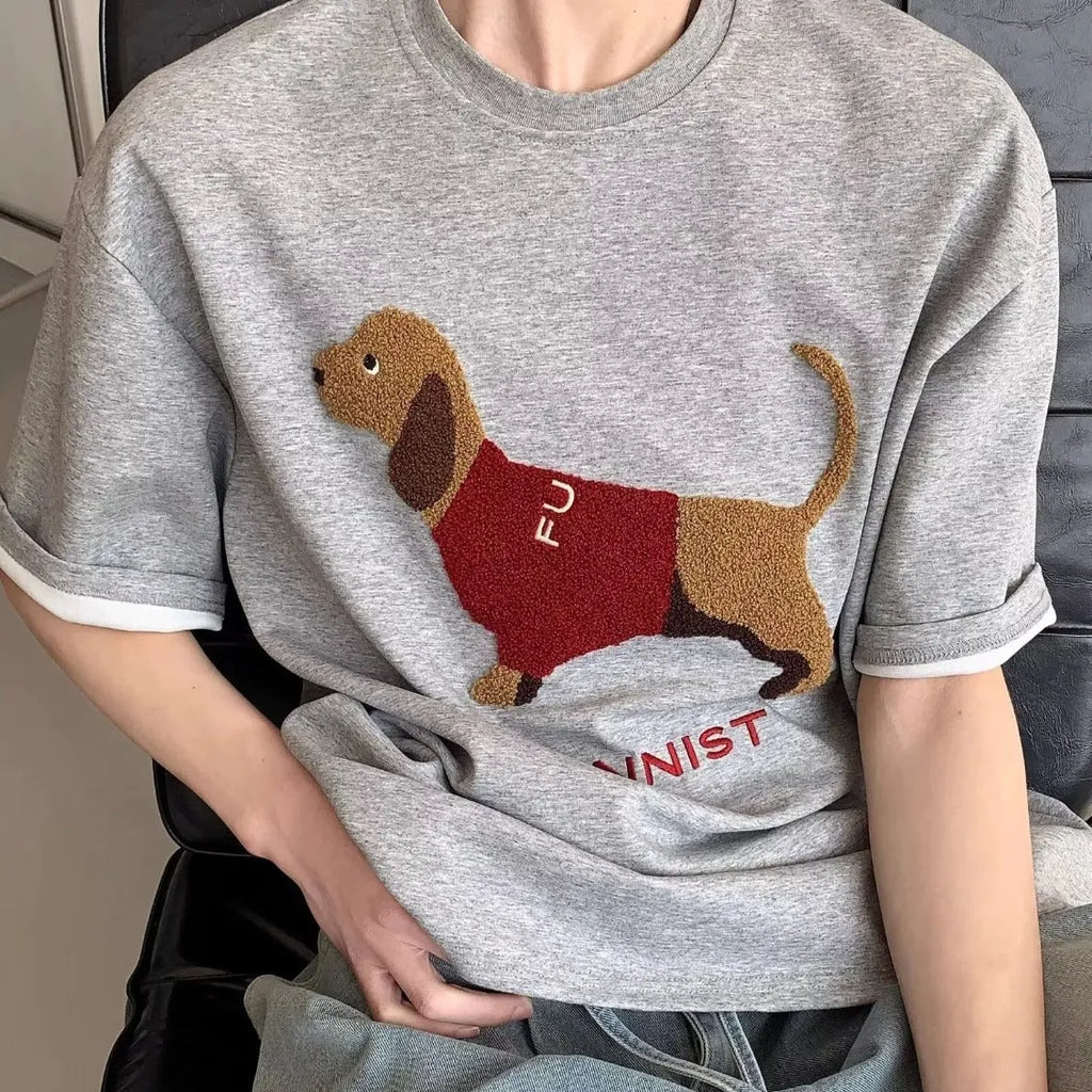Men's grey cotton t-shirt with embroidered dachshund dog design on the front.