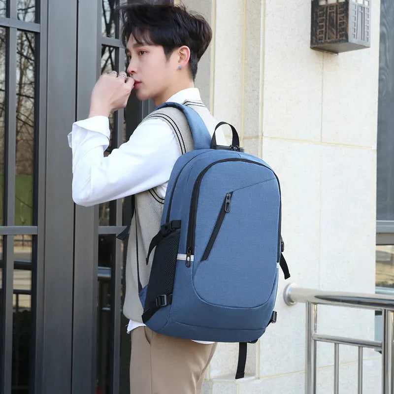 Oxford cloth computer backpack in blue colour showing front compartment and shoulder straps