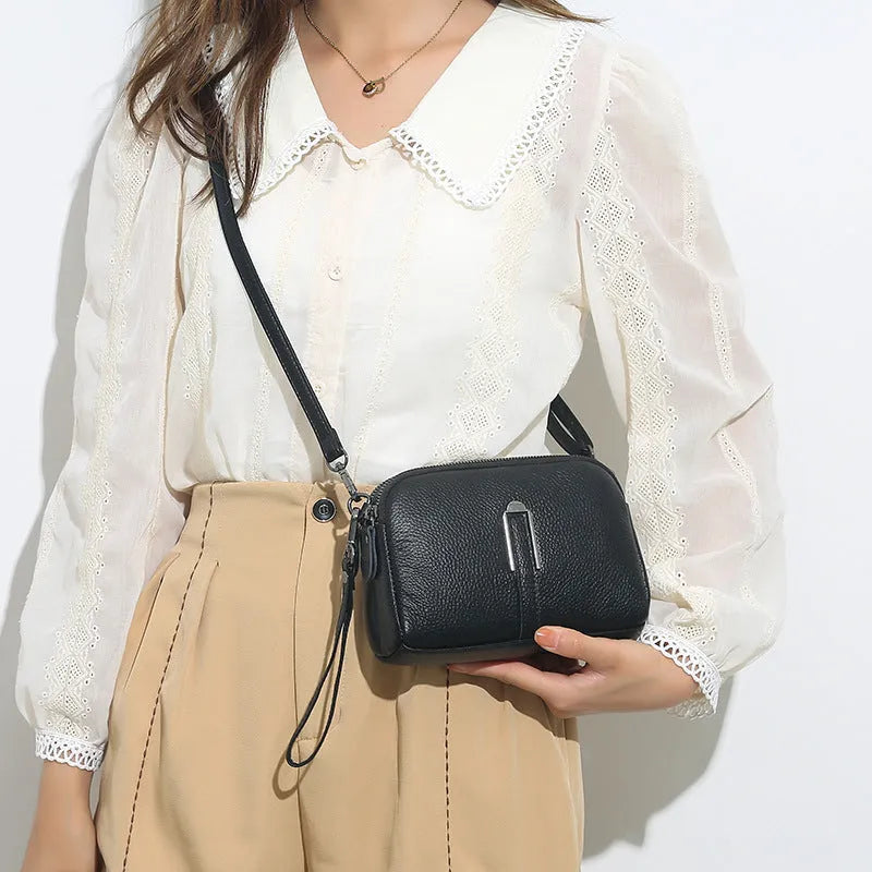 Genuine leather women's shoulder bag in horizontal square shape showing black colour option