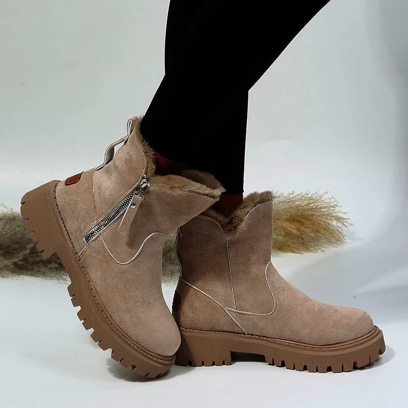 Women's black thick plush snow boots with faux suede upper, side zip, and non-slip rubber sole.