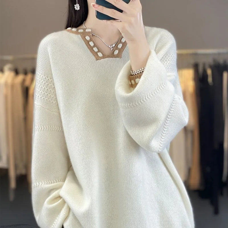 Women's white V-neck viscose sweater with regular long sleeves on mannequin