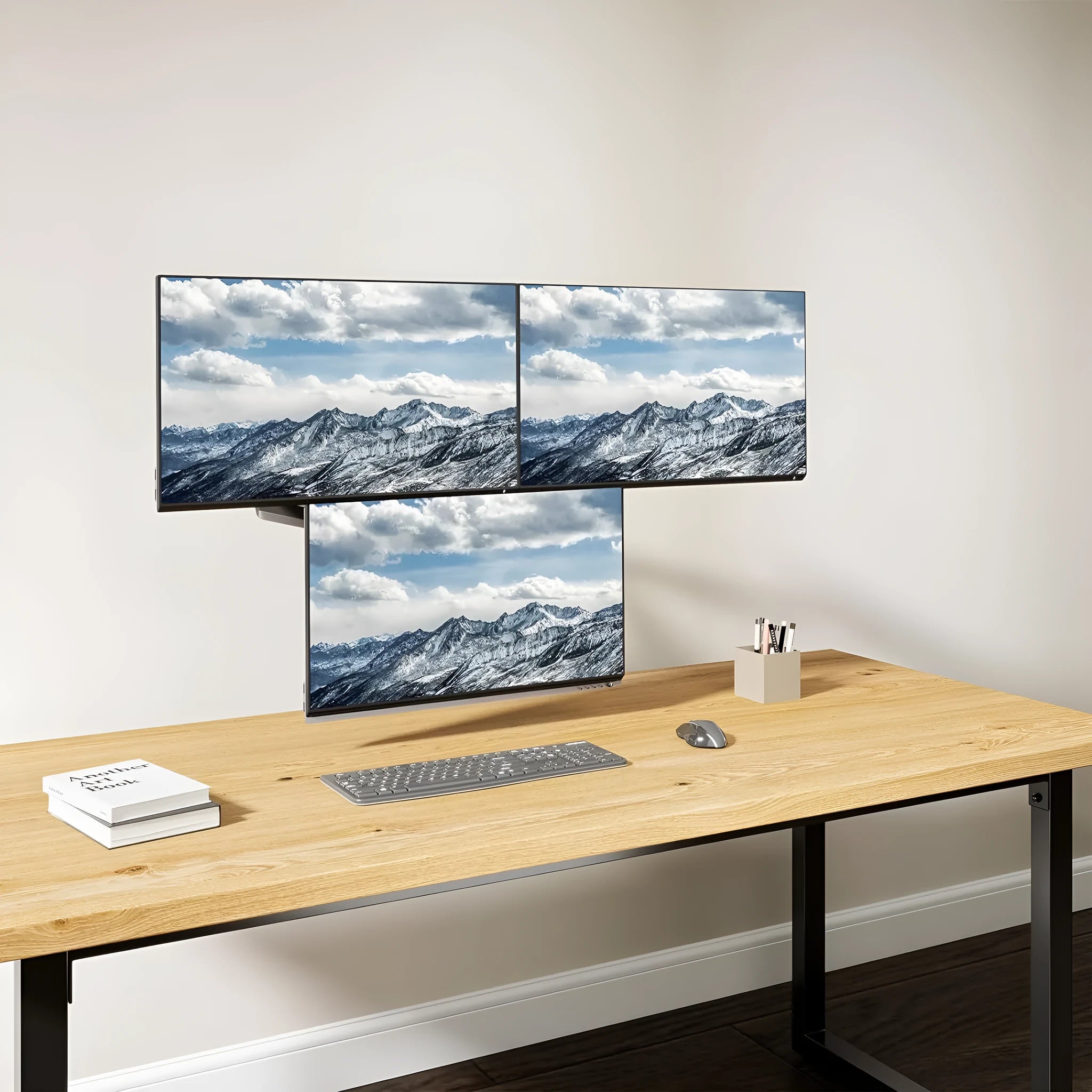 Black three-arm gas spring monitor mount for 27-inch screens with aluminium construction