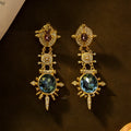 Gold retro geometry stud earrings with diamond treatment and round elements