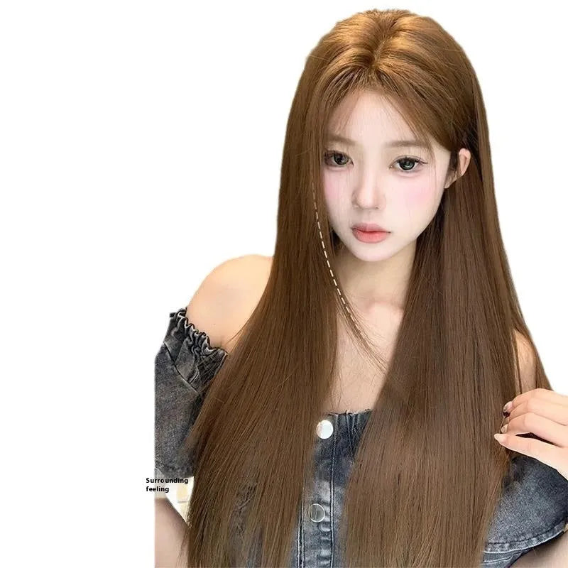 Warm brown long straight lace wig with centre-parted bangs for women on a wig stand