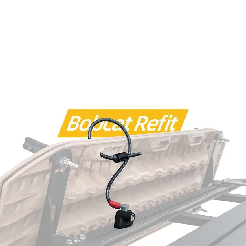 Roof platform steel cable lock with plastic sheath for securing camping kayaks and ladders.