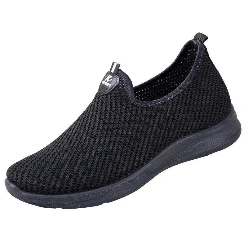 Spring men's breathable flyknit casual shoes in black with rubber sole – side view for hiking and daily wear