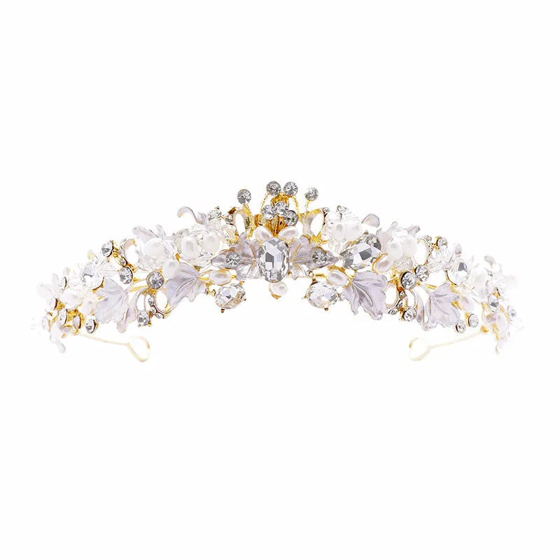 Gold metal alloy crown headdress with a white pearl-like decoration for women.