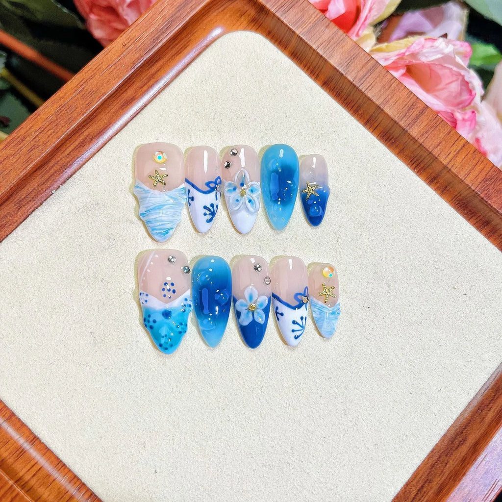 Blue hand-painted carved summer ice transparent fake nails plastic set with sizes XS S M L