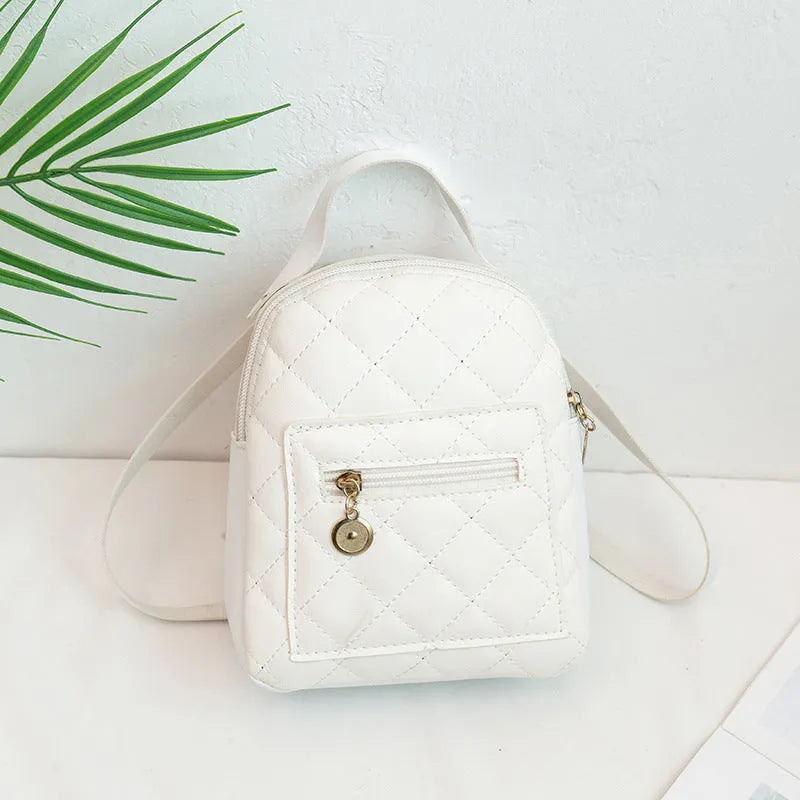 Korean style girls' embroidered PU backpack in white with hard shell construction and sandwich pocket