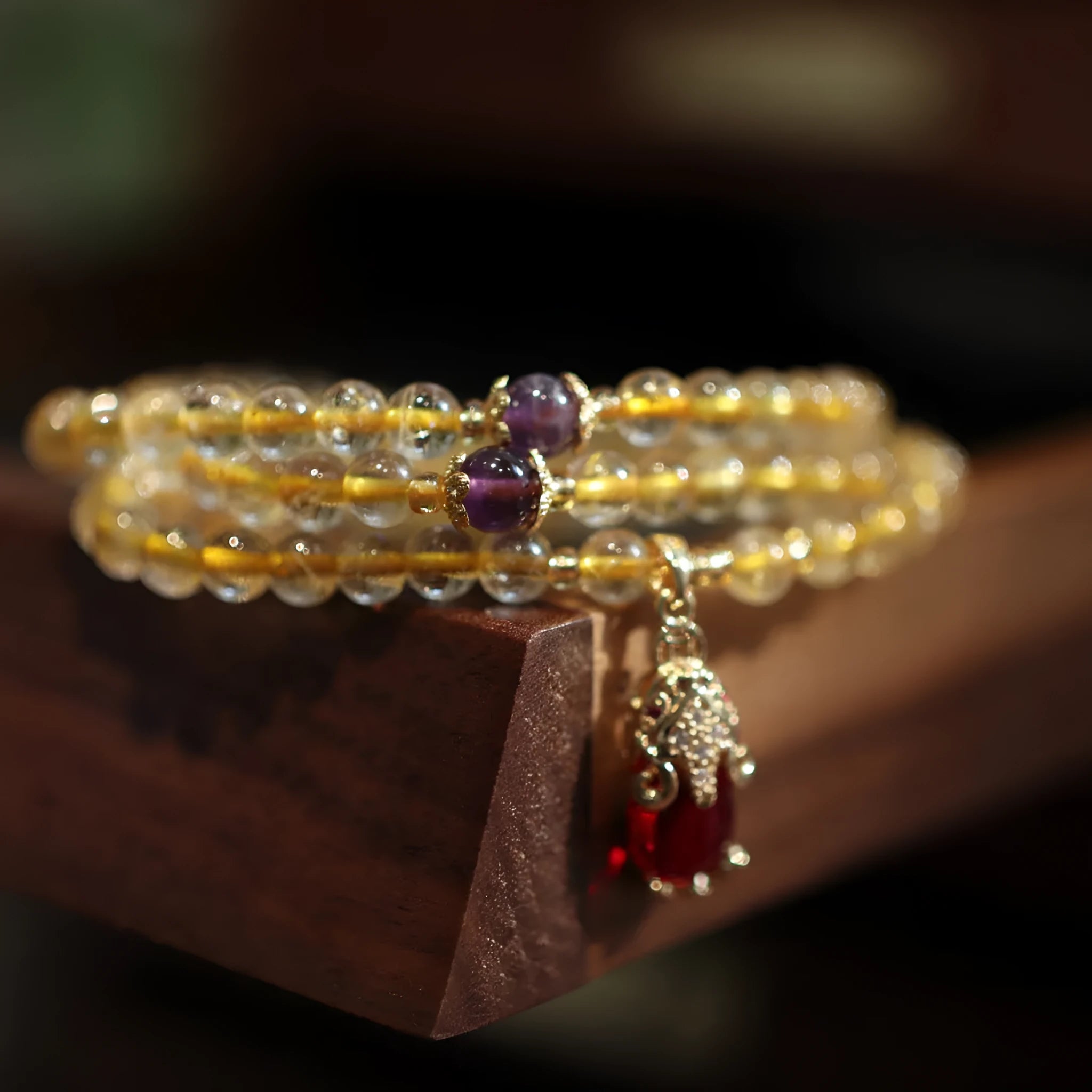 Natural Brazil gold rutilated quartz bracelet with three gold circles and ruby quartz hanging chopsticks charm