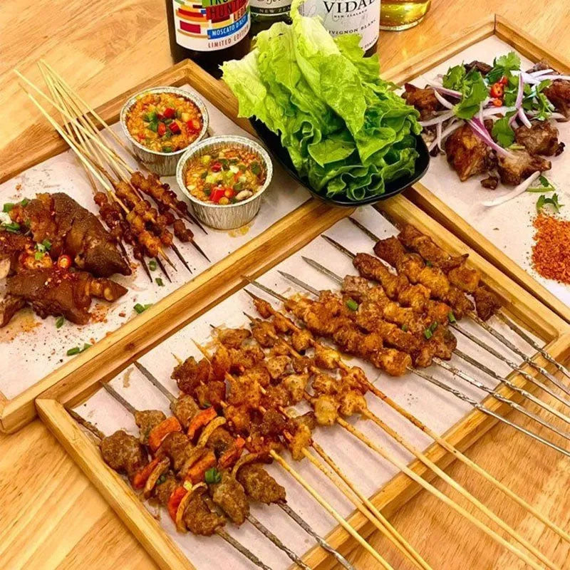 Square bamboo serving tray with brown handles in pastoral design