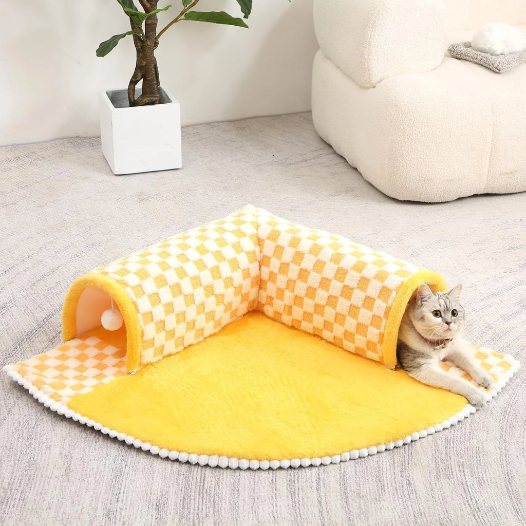 Coffee-coloured plush pet bed with attached tunnel showing soft sleeping area and play space