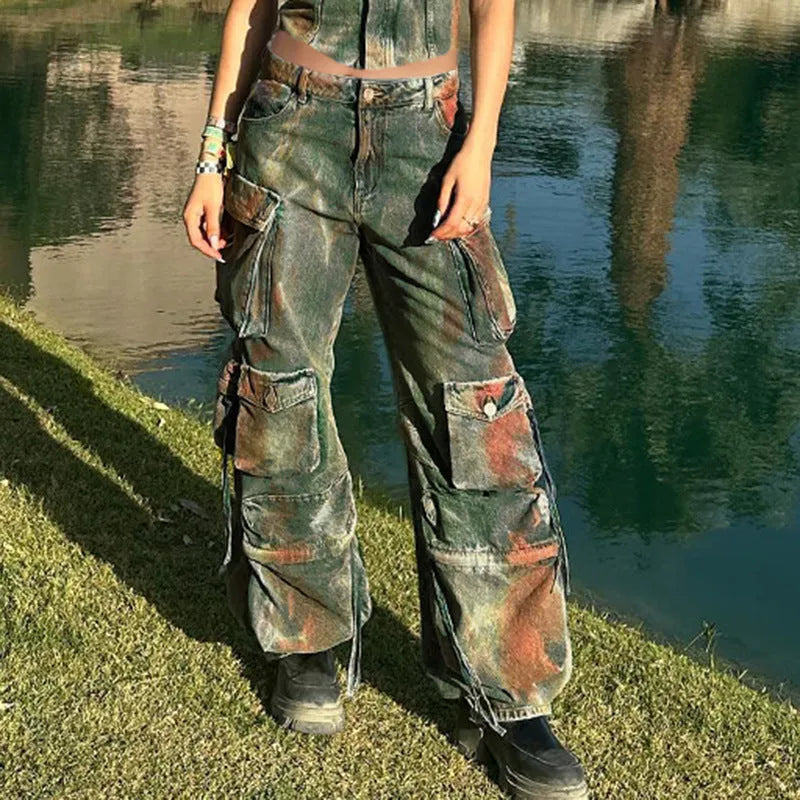 Loose fit cargo denim trousers with gradient coloured pockets and multiple storage compartments